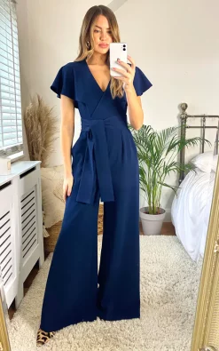 Edie B. Chloe Cape Sleeve Wide Leg Jumpsuit With Tie -DRESSES SHOP 2020 12 03 Megan Cara EdieB4