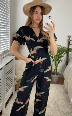 Yumi Crane Print Tie Jumpsuit In Black 7 Yumi Crane Print Tie Jumpsuit In Black -DRESSES SHOP 2021 04 08 Megan Cara Yumi64