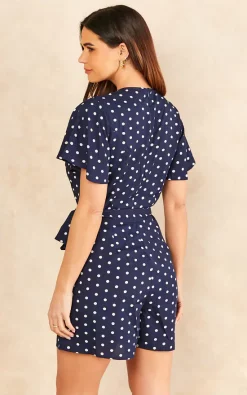 TENKI LONDON Ruffle Sleeve Polka Dot Wrap Romper Playsuit In Blue -DRESSES SHOP 2022 01 27 SF TOM Naomi Tenki33002
