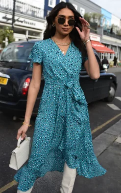 TENKI LONDON Ruffle Sleeve Patterned Ruffle Wrap Maxi Dress In Turquoise Blue