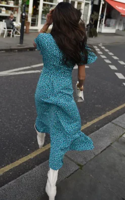 TENKI LONDON Ruffle Sleeve Patterned Ruffle Wrap Maxi Dress In Turquoise Blue 7 TENKI LONDON Ruffle Sleeve Patterned Ruffle Wrap Maxi Dress In Turquoise Blue -DRESSES SHOP 2022 02 21 Mollie Shree Tenki73