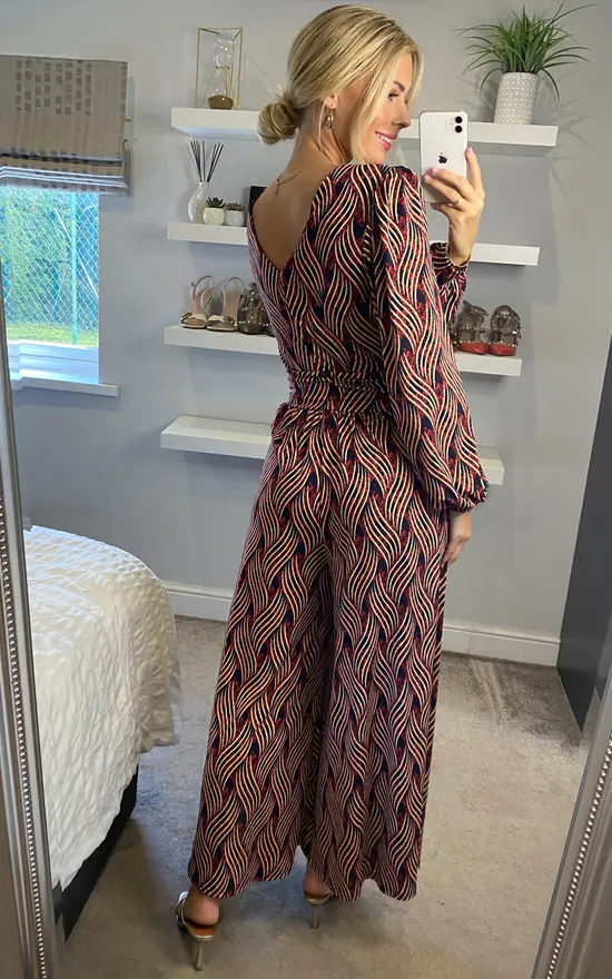 JOLIE MOI Devora Long Sleeve Jumpsuit In Red Multi 4 JOLIE MOI Devora Long Sleeve Jumpsuit In Red Multi - Image 4